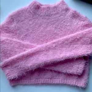 pink fluffy turtleneck sweater
